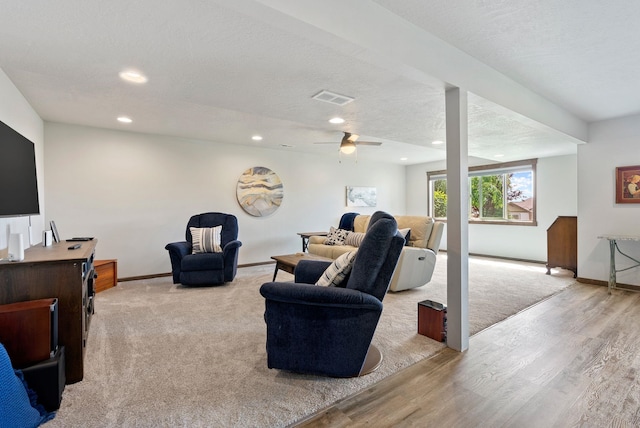 8814 E Clearview Ln, Spokane, WA 99217 - living room with recessed lighting, light wood-style floors, ceiling fan, and a textured ceiling