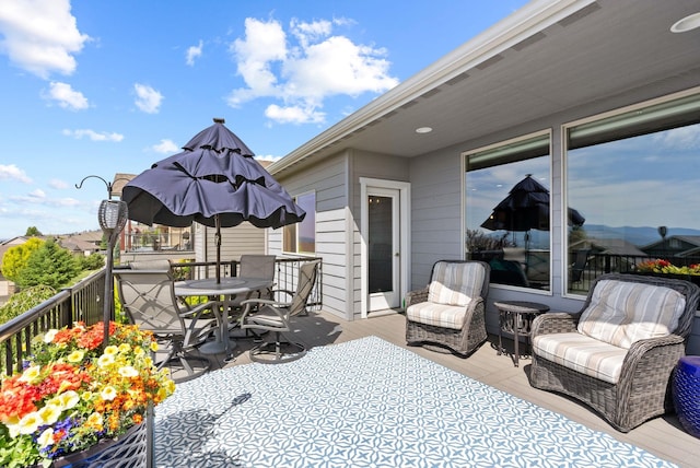 8814 E Clearview Ln, Spokane, WA 99217 - view of patio with a wooden deck and outdoor dining area
