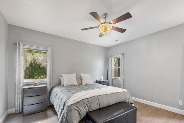 4171 S Westway Dr, Coeur D Alene, ID 83814 - bedroom featuring light wood-style floors and a ceiling fan