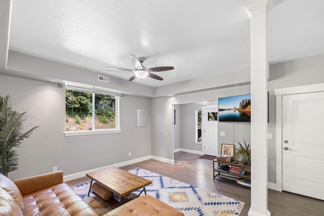 4171 S Westway Dr, Coeur D Alene, ID 83814 - living area featuring decorative columns, ceiling fan, and wood finished floors