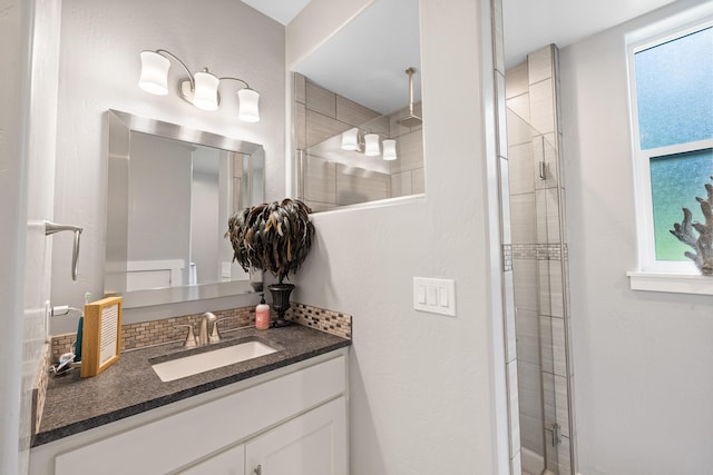 4171 S Westway Dr, Coeur D Alene, ID 83814 - full bathroom with vanity, tiled shower, and plenty of natural light
