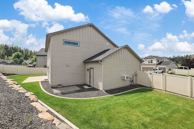 4813 S Lapwai Ln, Spokane, WA 99206 - rear view of property featuring board and batten siding, a wall mounted AC, a patio, and a shingled roof