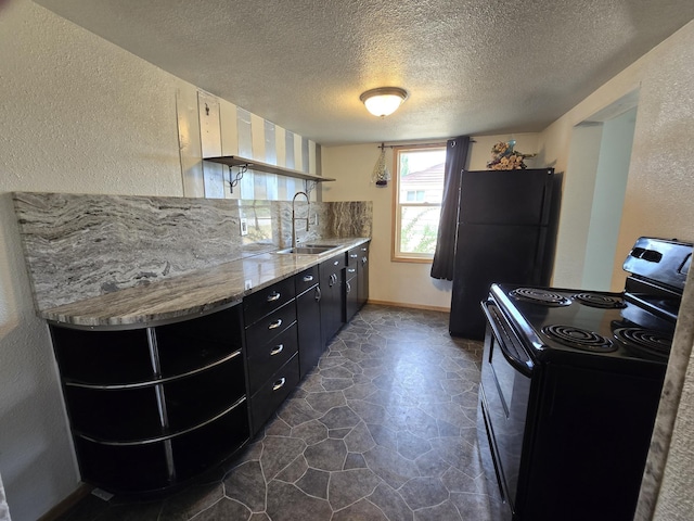 1528 E Boone Ave, Spokane, WA 99202 - kitchen with black appliances, dark cabinets, a textured ceiling, a textured wall, and open shelves