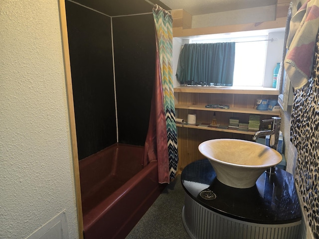 1528 E Boone Ave, Spokane, WA 99202 - bathroom with shower / tub combo with curtain and a textured wall