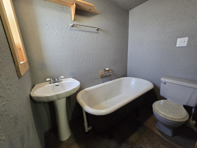 1528 E Boone Ave, Spokane, WA 99202 - full bath featuring a freestanding tub and a textured wall