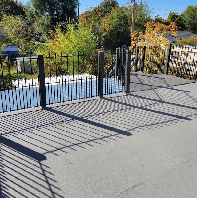 1528 E Boone Ave, Spokane, WA 99202 - gate featuring a patio and a pool