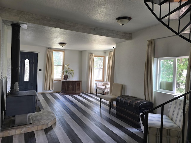 1528 E Boone Ave, Spokane, WA 99202 - foyer featuring a textured ceiling and wood finished floors
