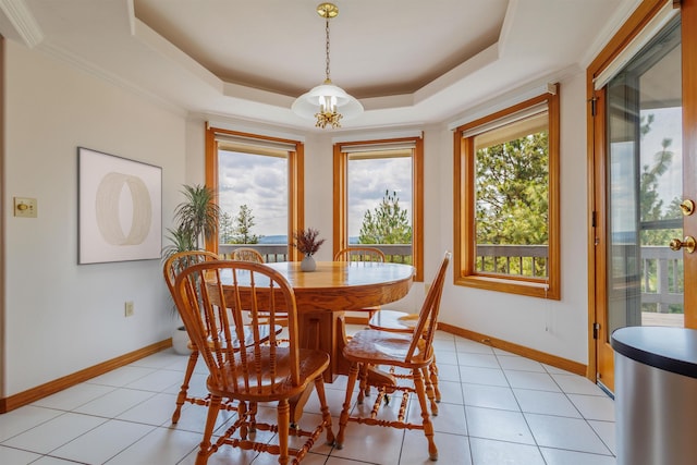 10207 N Comanche Dr, Spokane, WA 99208 - dining room with a tray ceiling and light tile patterned floors