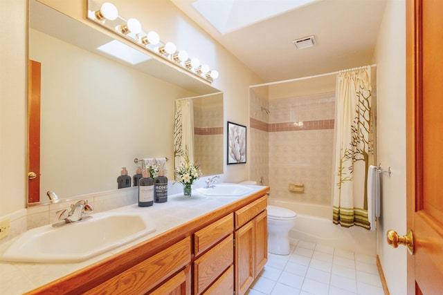 10207 N Comanche Dr, Spokane, WA 99208 - bathroom with a skylight, tile patterned flooring, double vanity, and shower / bath combination with curtain