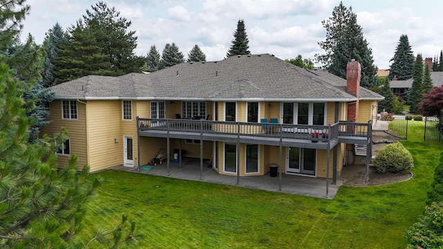 10207 N Comanche Dr, Spokane, WA 99208 - back of house with a patio, a deck, a chimney, and a shingled roof