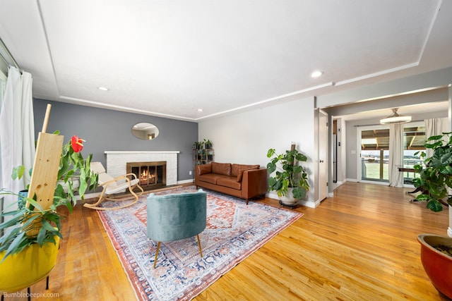 224 W Hoerner Ave, Spokane, WA 99218 - living area with a brick fireplace, wood finished floors, and recessed lighting