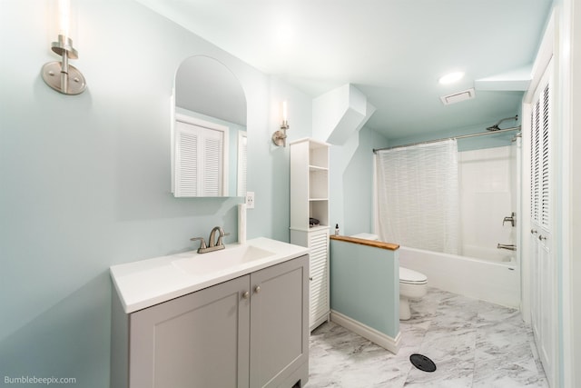 224 W Hoerner Ave, Spokane, WA 99218 - bathroom with vanity, marble look tiles, shower / bath combo with shower curtain, and a closet