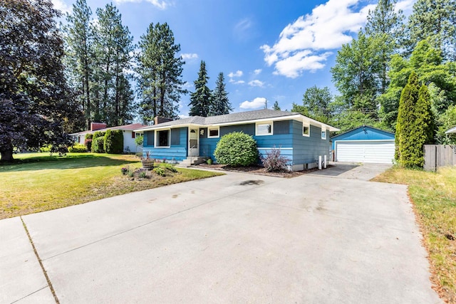 224 W Hoerner Ave, Spokane, WA 99218 - ranch-style home featuring a detached garage, a front yard, an outdoor structure, and entry steps
