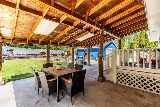 224 W Hoerner Ave, Spokane, WA 99218 - fenced backyard featuring a patio area, outdoor dining area, and a deck