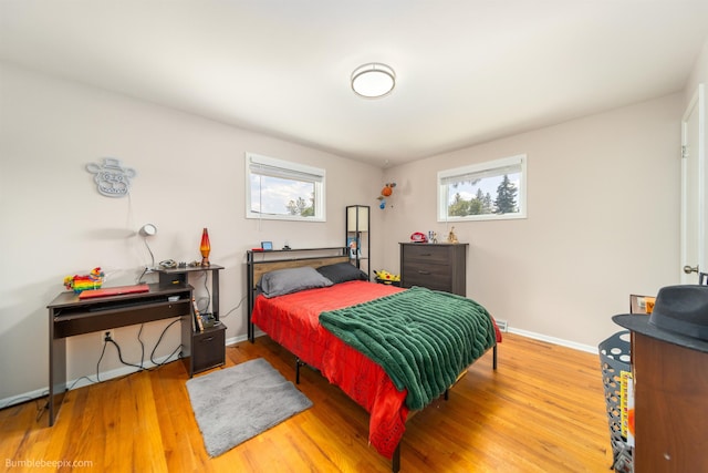 224 W Hoerner Ave, Spokane, WA 99218 - bedroom featuring wood finished floors and baseboards