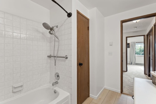 7878 N Wilding Dr # 32, Spokane, WA 99208 - bathroom featuring shower / bath combination and a textured ceiling