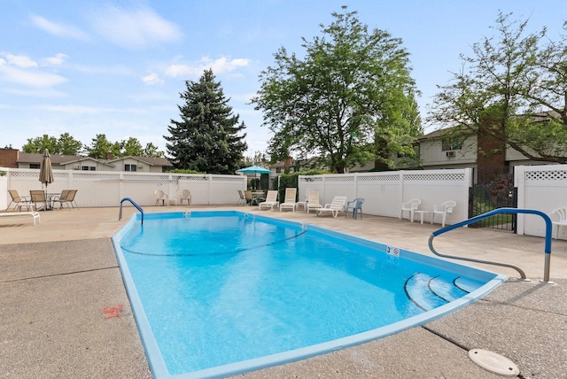7878 N Wilding Dr # 32, Spokane, WA 99208 - community pool featuring a patio