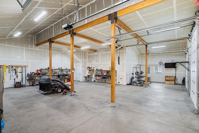 3 W Montgomery Rd, Deer Park, WA 99006 - garage with a workshop area and a garage door opener
