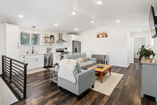 3 W Montgomery Rd, Deer Park, WA 99006 - living area with lofted ceiling, dark wood-style flooring, and recessed lighting