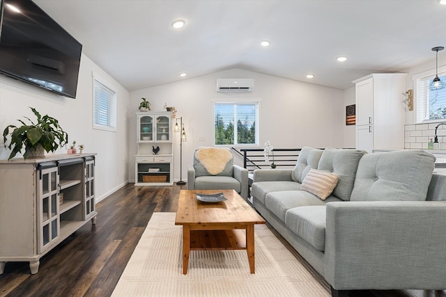 3 W Montgomery Rd, Deer Park, WA 99006 - living room with a wall mounted air conditioner, lofted ceiling, dark wood finished floors, plenty of natural light, and recessed lighting
