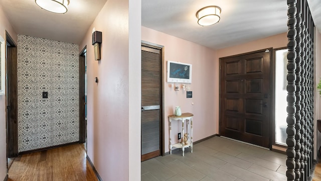 709 W Clay Ave, Chewelah, WA 99109 - entryway with baseboards and light wood-type flooring