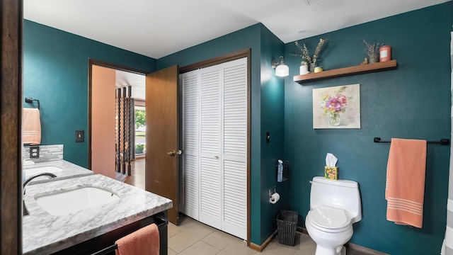 709 W Clay Ave, Chewelah, WA 99109 - bathroom with a closet and double vanity