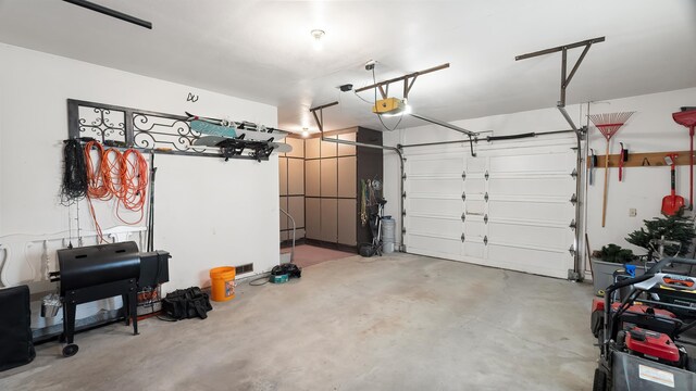 709 W Clay Ave, Chewelah, WA 99109 - garage with a garage door opener