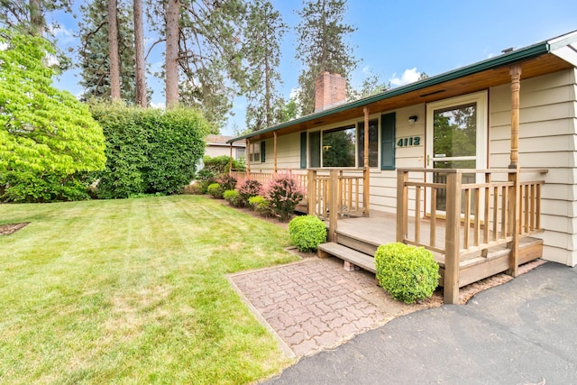 4112 S Hogan St, Spokane, WA 99203 - view of grassy yard with a wooden deck