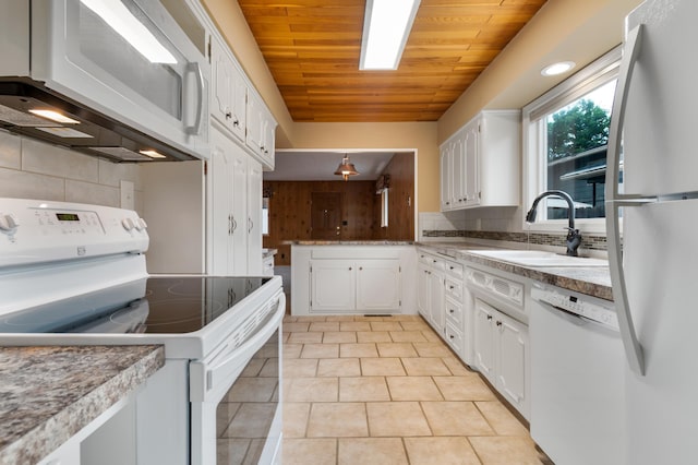 4112 S Hogan St, Spokane, WA 99203 - kitchen with white appliances, backsplash, white cabinets, wood ceiling, and light tile patterned floors