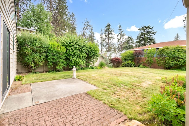 4112 S Hogan St, Spokane, WA 99203 - fenced backyard featuring a patio