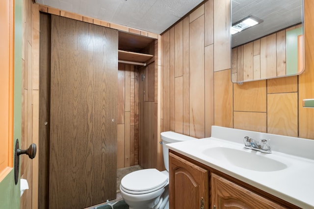 4112 S Hogan St, Spokane, WA 99203 - full bath featuring vanity, a shower stall, and wood walls