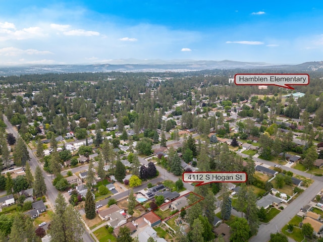 4112 S Hogan St, Spokane, WA 99203 - aerial view of property's location featuring a mountain backdrop