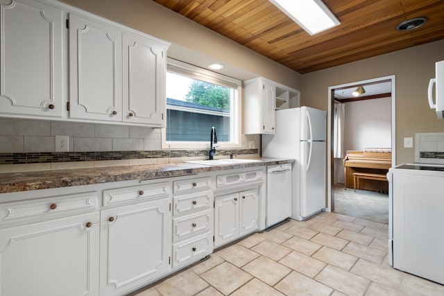 4112 S Hogan St, Spokane, WA 99203 - kitchen with white appliances, tasteful backsplash, wood ceiling, and white cabinets