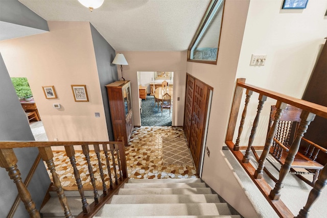 13614 N Minihdoka Trl, Spokane, WA 99208 - stairs featuring a textured ceiling