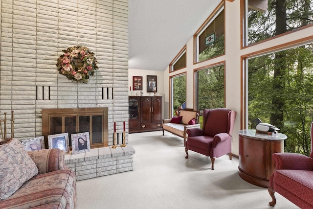 13614 N Minihdoka Trl, Spokane, WA 99208 - carpeted living area with high vaulted ceiling and a fireplace