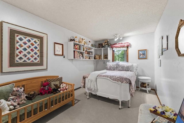13614 N Minihdoka Trl, Spokane, WA 99208 - carpeted bedroom with a textured ceiling and baseboards