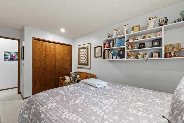13614 N Minihdoka Trl, Spokane, WA 99208 - bedroom with carpet, a closet, and recessed lighting