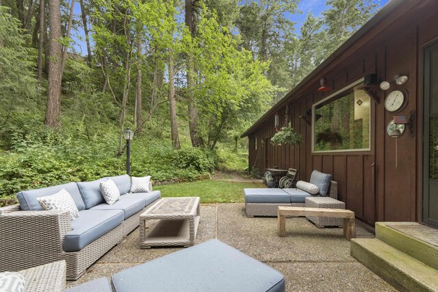 13614 N Minihdoka Trl, Spokane, WA 99208 - view of property exterior featuring stone siding and board and batten siding