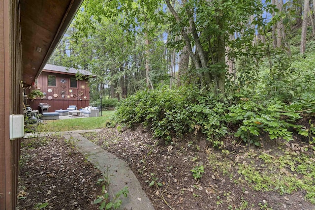 13614 N Minihdoka Trl, Spokane, WA 99208 - view of yard with an outdoor hangout area and a patio area