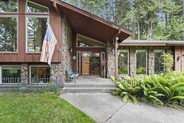 13614 N Minihdoka Trl, Spokane, WA 99208 - doorway to property featuring stone siding