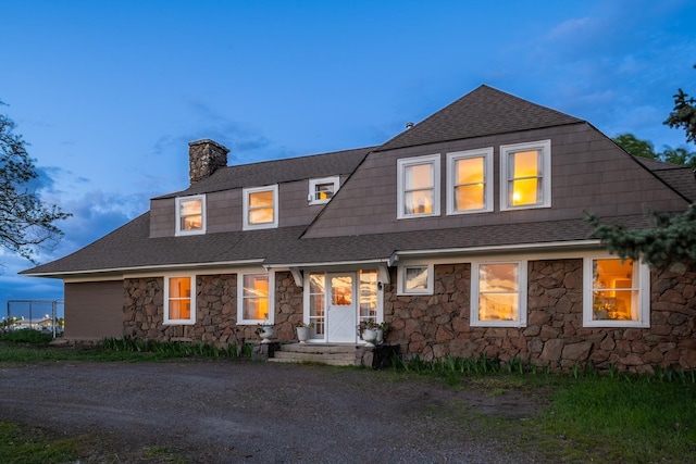 1625 S Hayford Rd, Spokane, WA 99224 - view of front of house with stone siding, a shingled roof, and a chimney