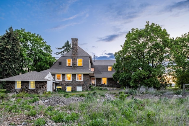 1625 S Hayford Rd, Spokane, WA 99224 - back of house with stone siding and a chimney