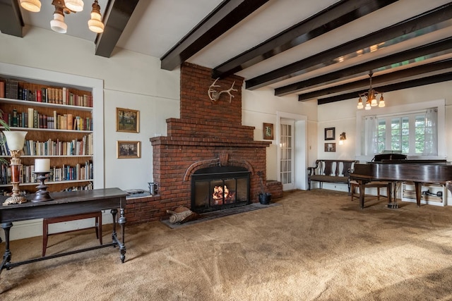 1625 S Hayford Rd, Spokane, WA 99224 - carpeted living room featuring beam ceiling, a chandelier, and a brick fireplace