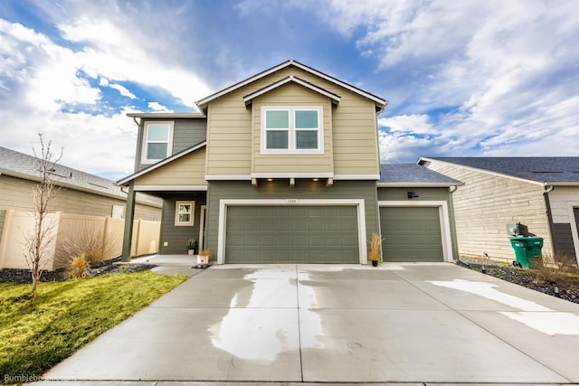 3640 S Clinton Rd, Spokane Valley, WA 99206 - traditional-style house with concrete driveway and an attached garage