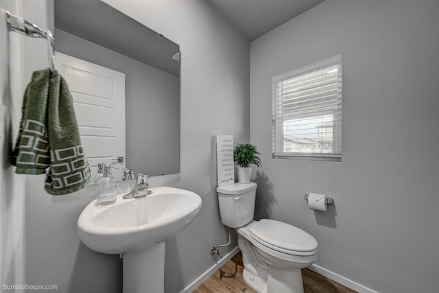 3640 S Clinton Rd, Spokane Valley, WA 99206 - bathroom with wood finished floors and toilet