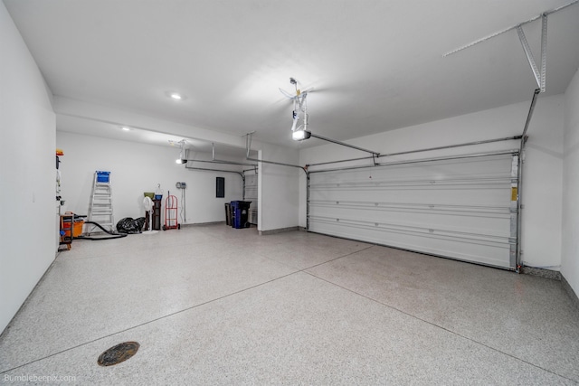 3640 S Clinton Rd, Spokane Valley, WA 99206 - garage with a garage door opener and recessed lighting