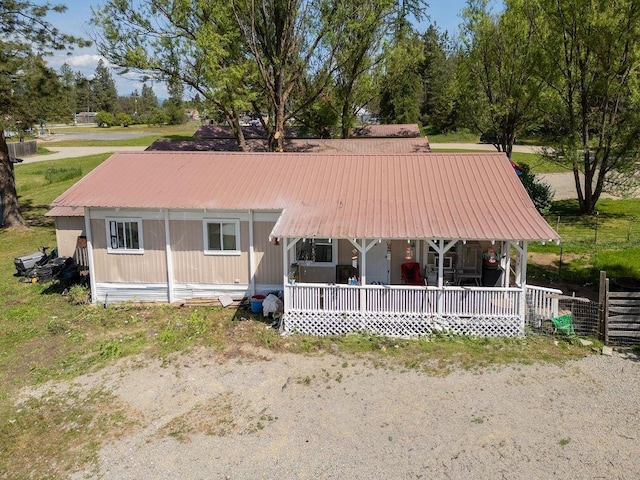 105 E Aspen Ave, Springdale, WA 99173 - view of front of property featuring covered porch and a metal roof