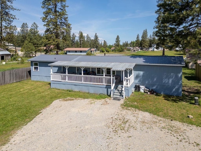 105 E Aspen Ave, Springdale, WA 99173 - view of front facade with a porch and a metal roof