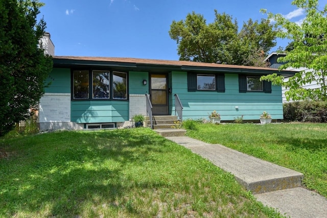 3308 W Kiernan Ave, Spokane, WA 99205 - ranch-style house with entry steps, a front yard, and a chimney