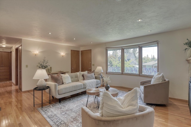 3308 W Kiernan Ave, Spokane, WA 99205 - living room featuring light wood-style flooring and recessed lighting